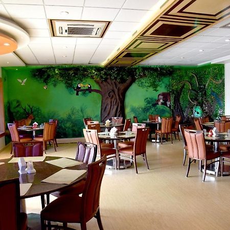 אודופי Hotel Sharada International מראה חיצוני תמונה