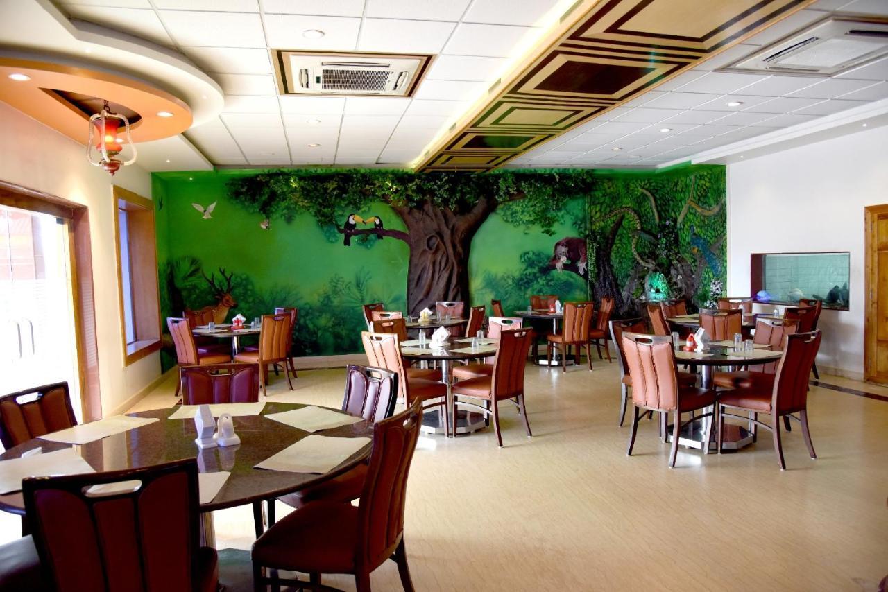 אודופי Hotel Sharada International מראה חיצוני תמונה